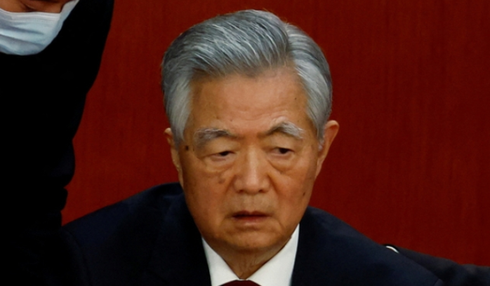 Former President Hu Jintao suddenly left during…